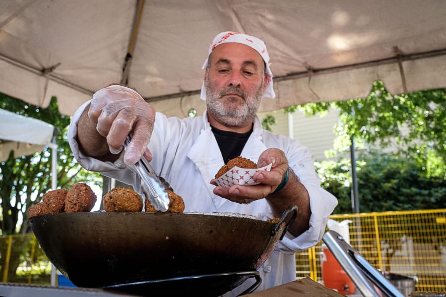 Mohamad Taha, owner and chef of Moe’s Falafel from Beaverton, Ore., serving fresh made falafel at the Vancouver Wine & Jazz Festival in 2016.