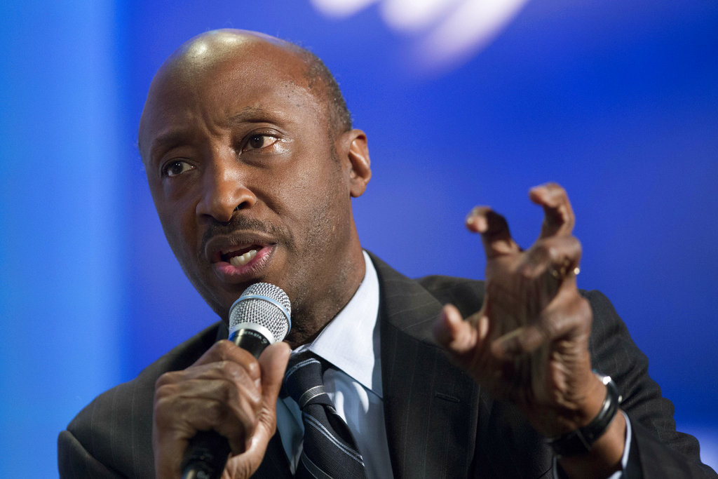 FILE - In this Sunday, Sept. 27, 2015, file photo, Merck Chairman and CEO Kenneth Frazier participates in a session "The Future of Impact,"  at the Clinton Global Initiative in New York. Frazier is resigning from the President’s American Manufacturing Council citing "a responsibility to take a stand against intolerance and extremism." Frazier's resignation comes shortly after a violent confrontation between white supremacists and protesters in Charlottesville, Va. U.S. President Donald Trump is being criticized for not explicitly condemning the white nationalists who marched in Charlottesville.