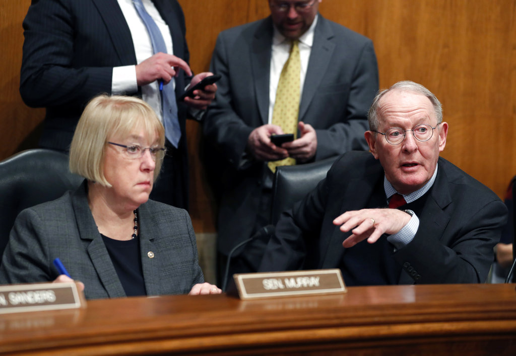 FILE - In this Jan. 31, 2017 file photo, Senate Health, Education, Labor, and Pensions Committee Chairman Sen. Lamar Alexander, R-Tenn. and the committee's ranking member Sen. Patty Murray, D-Wash. are seen on Capitol Hill in Washington. The leaders of the Senate health committee say they are scheduling two hearings early next month on how the nation’s individual health insurance marketplaces can be stabilized.