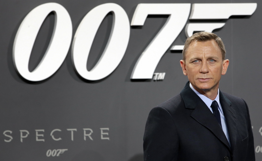 Daniel Craig poses for the media as he arrives for the German premiere of the James Bond movie ‘Spectre’ in Berlin, Germany. British actor Daniel Craig announced he returning to cars, cocktails and camera pens to play James Bond in the franchise’s next film, due out in 2019.
