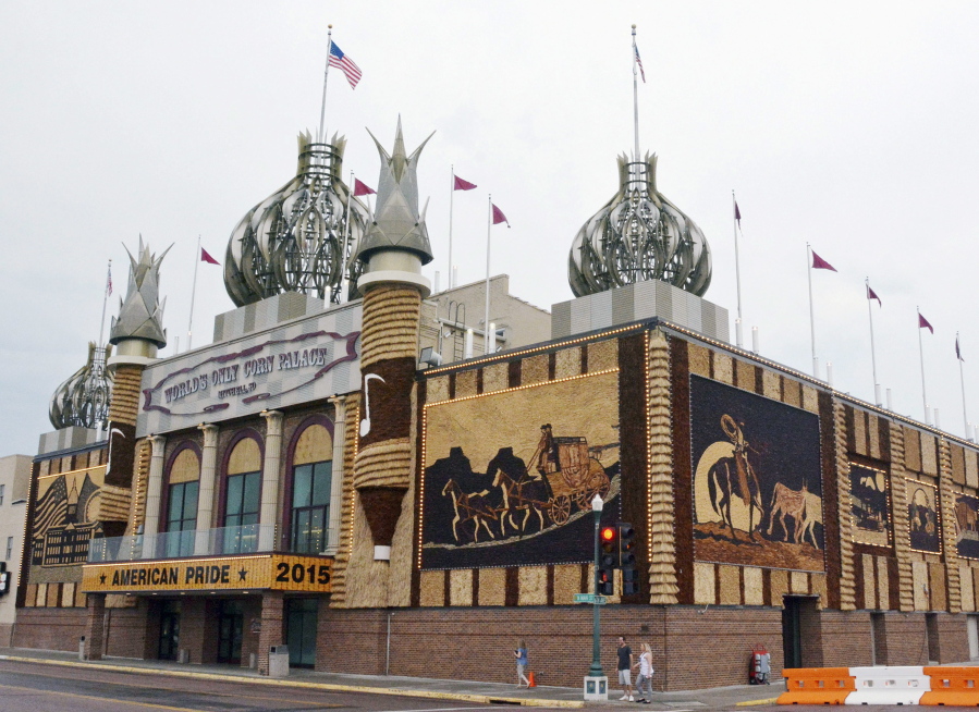 FILE - This Sept. 1, 2015, file photo shows the Corn Palace in Mitchell, S.D. The corn-themed tourist destination will have enough corn to decorate murals despite a dry summer. The director of the Corn Palace said that the city has enough corn to create the nine corn murals surrounding the facility thanks to recent rain. About 275,000 ears of corn are needed for the building, which is currently adorned with 2-year-old dilapidated murals.