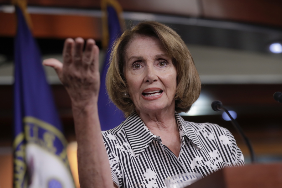 FILE - In this July 27, 2017 file photo, House Minority Leader Nancy Pelosi of Calif. gestures during a news conference on Capitol Hill in Washington. Pelosi is calling for the removal of Confederate statues from the U.S. Capitol as the contentious debate over the appropriateness of such memorials moves to the halls of Congress. (AP Photo/J.