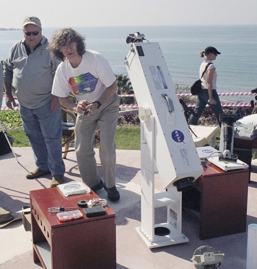 Glenn Schneider, center, is shown with his “lug-o-scope” in Turkey in 2006. He has seen 33 eclipses.