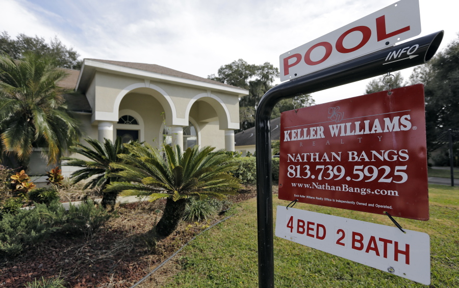 FILE - This Tuesday, Jan. 26, 2016, file photo shows an existing home for sale in Valrico, Fla. On Thursday, Aug. 24, 2017, the National Association of Realtors reports on sales of existing homes in July.