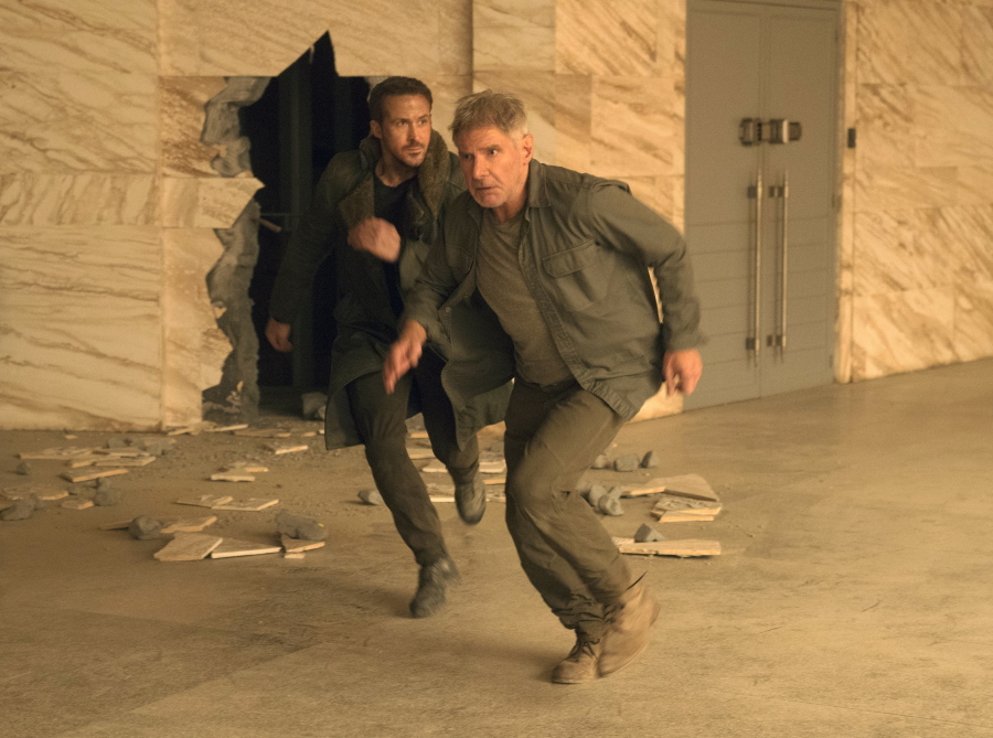 Ryan Gosling, left, and Harrison Ford in “Blade Runner 2049.” Warner Bros.