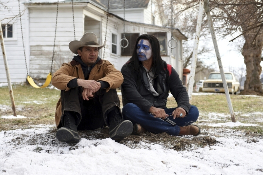 This image released by The Weinstein Company shows Jeremy Renner, left, and Gil Birmingham in a scene from “Wind River.” (Fred Hayes/The Weinstein Company via AP)