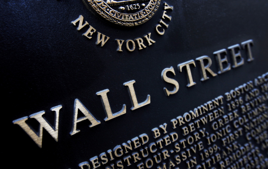 FILE - This Jan. 4, 2010, file photo shows an historic marker on Wall Street in New York. U.S. stocks continued to skid early Friday, Aug. 18, 2017, as industrial companies fell after a weak report from farm equipment giant Deere.