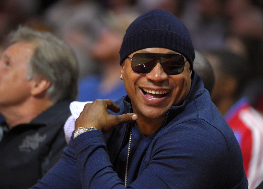Rapper/actor LL Cool J watches the Los Angeles Clippers play the Utah Jazz during the first half of an NBA basketball game in Los Angeles in 2014. The John F. Kennedy Center for the Performing Arts on Thursday announced the recipients of the 2017 Kennedy Center Honors. They are: hip-hop artist LL Cool J, singers Gloria Estefan and Lionel Richie, television writer and producer Norman Lear and dancer Carmen de Lavallade. It’s the 40th year of the awards, which honor people who have influenced American culture through the arts. (AP Photo/Mark J.