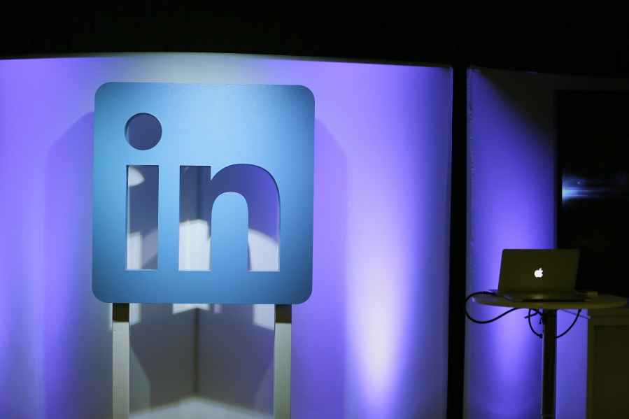 FILE - In this Thursday, Sept. 22, 2016, file photo, the LinkedIn logo is displayed during a product announcement in San Francisco. On Monday, Aug. 14, 2017, a federal judge ordered LinkedIn to stop blocking startup firm hiQ Labs, Inc. from scraping LinkedIn personal profiles for data.