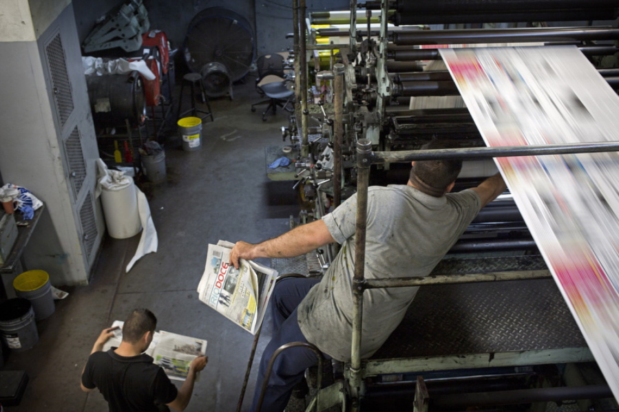 Workers print the latest issue of the weekly newspaper Riodoce, in Culiacan, Sinaloa state, Mexico. Journalists at Riodoce persist in covering the violence of Sinaloa, though they are heartbroken after the murder of their paper’s co-founder Javier Valdez and the terrain is more treacherous now.
