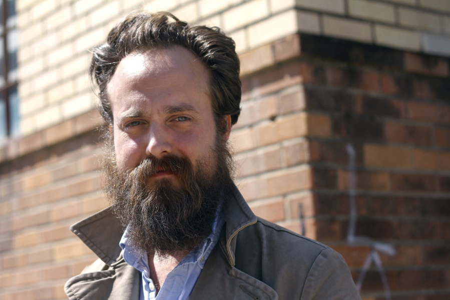 Sam Beam, of Iron & Wine, seen during the 2013 SXSW Music Festival in Austin, Texas, has returned both to the Sub Pop label where his career started and the warm, acoustic sound of his early material.