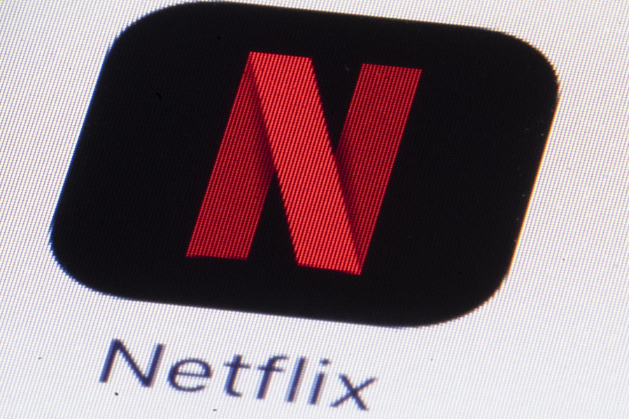 FILE - This Monday, July 17, 2017, file photo shows the Netflix logo on an iPhone in Philadelphia. Much of the attention showered on Netflix focuses on its insatiable appetite for original content. But this streaming network’s multi-billion-dollar annual outlay for new programming necessitates another challenge: Matching each program with the subscribers who are likely to enjoy it. Netflix tags content, then identifies viewer habits.