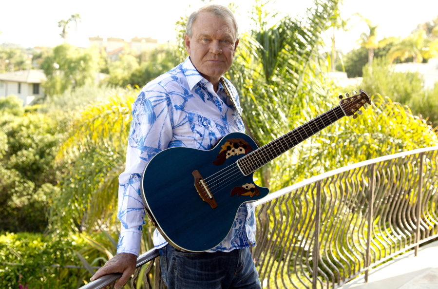 Musician Glen Campbell poses for a portrait in Malibu, Calif., in 2011. Campbell, who had such hits as “Rhinestone Cowboy” and spanned television and movies, died Tuesday.