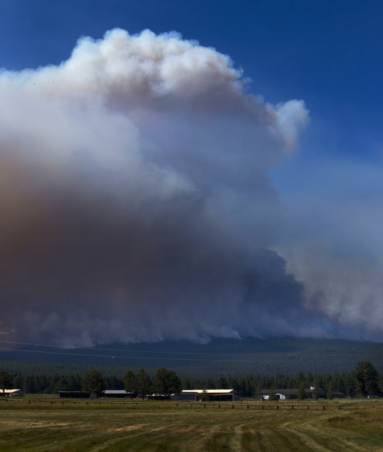 A wildfire burns just outside of Sister, Ore., Friday Aug. 18, 2017.