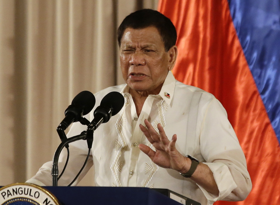 Philippine President Rodrigo Duterte gestures during the 19th Founding Anniversary of the Volunteers Against Crime and Corruption at the Malacanang Presidential Palace in Manila, Philippines. Philippine police say they have killed at least 26 more drug offenders in overnight gun battles in the capital which brought the death toll in the president’s renewed crackdown to 58 in the last three days.
