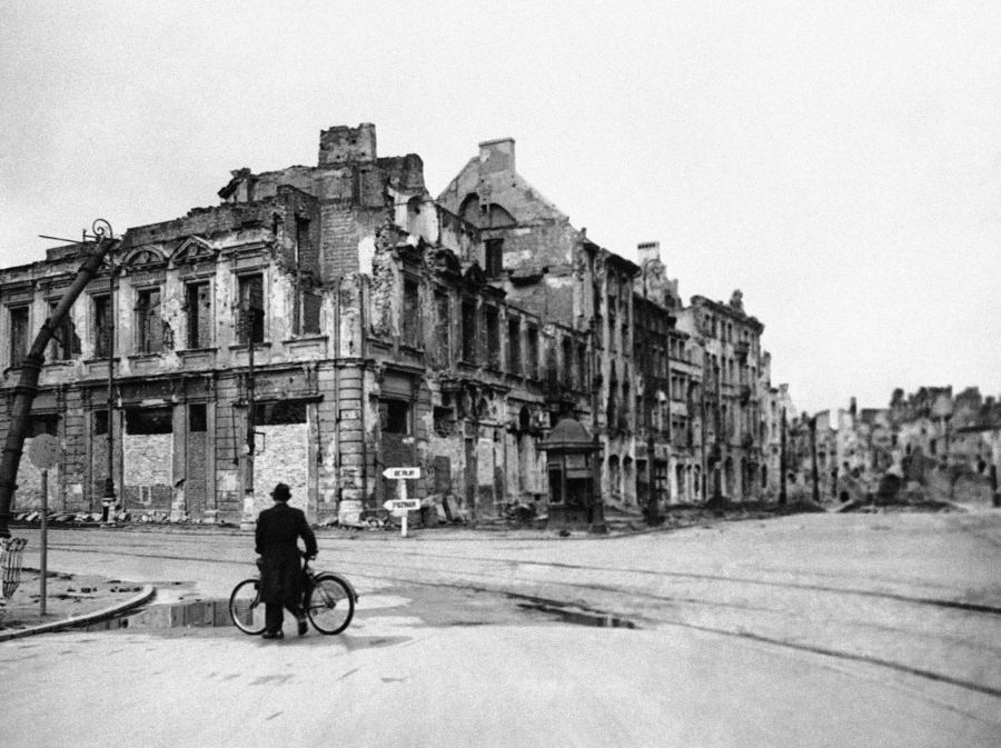 A solitary cyclist contemplates a panorama of total destruction Oct. 1, 1945, in Warsaw, the capital of Poland, months after World War II. Poland’s government is calling on Germany to pay it reparations for World War II, when more than five years of brutal Nazi occupation killed nearly a fifth of the population and wiped out industry and cultural wealth. But Germany says the matter was settled long ago and experts say there is no legal basis for Poland to demand reparations. That leaves government critics saying the real aim must be to create an external enemy as Poland’s ties with Western Europe sour.
