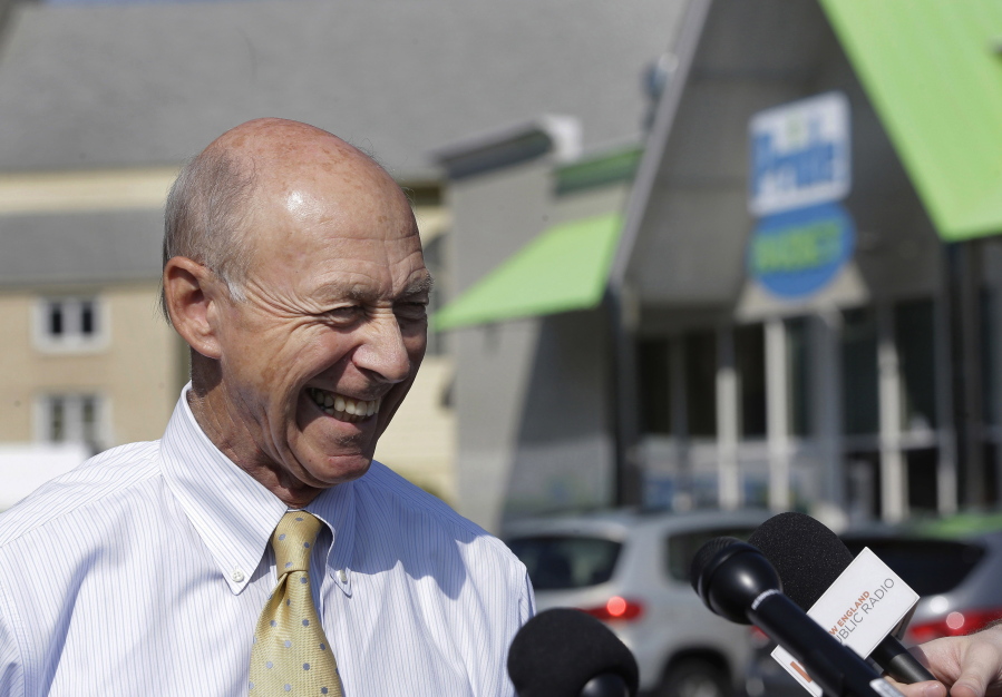 Bob Bolduc, founder and owner of Pride stores, smiles as he takes questions from members of the media during a news conference at the Pride Station & Store on Thursday in Chicopee, Mass., where the winning ticket for the Powerball was sold.