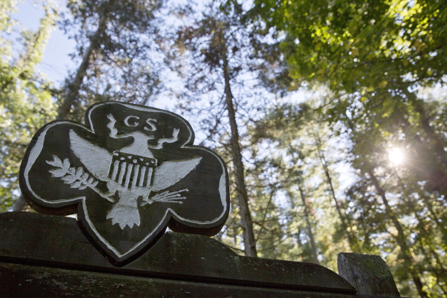 The official Girl Scouts crest is seen at the entrance of a Girl Scout Camp in Lapeer, Mich.
