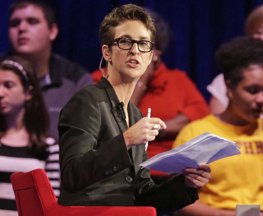 MSNBC’s Rachel Maddow speaks during a Democratic presidential candidate forum at Winthrop University in Rock Hill, S.C. Maddow has turned politics into prime-time entertainment for people worried about the state of the new presidency. MSNBC achieved other milestones in July, including its closest finish to Fox since 2000 and largest margin of victory over CNN ever.