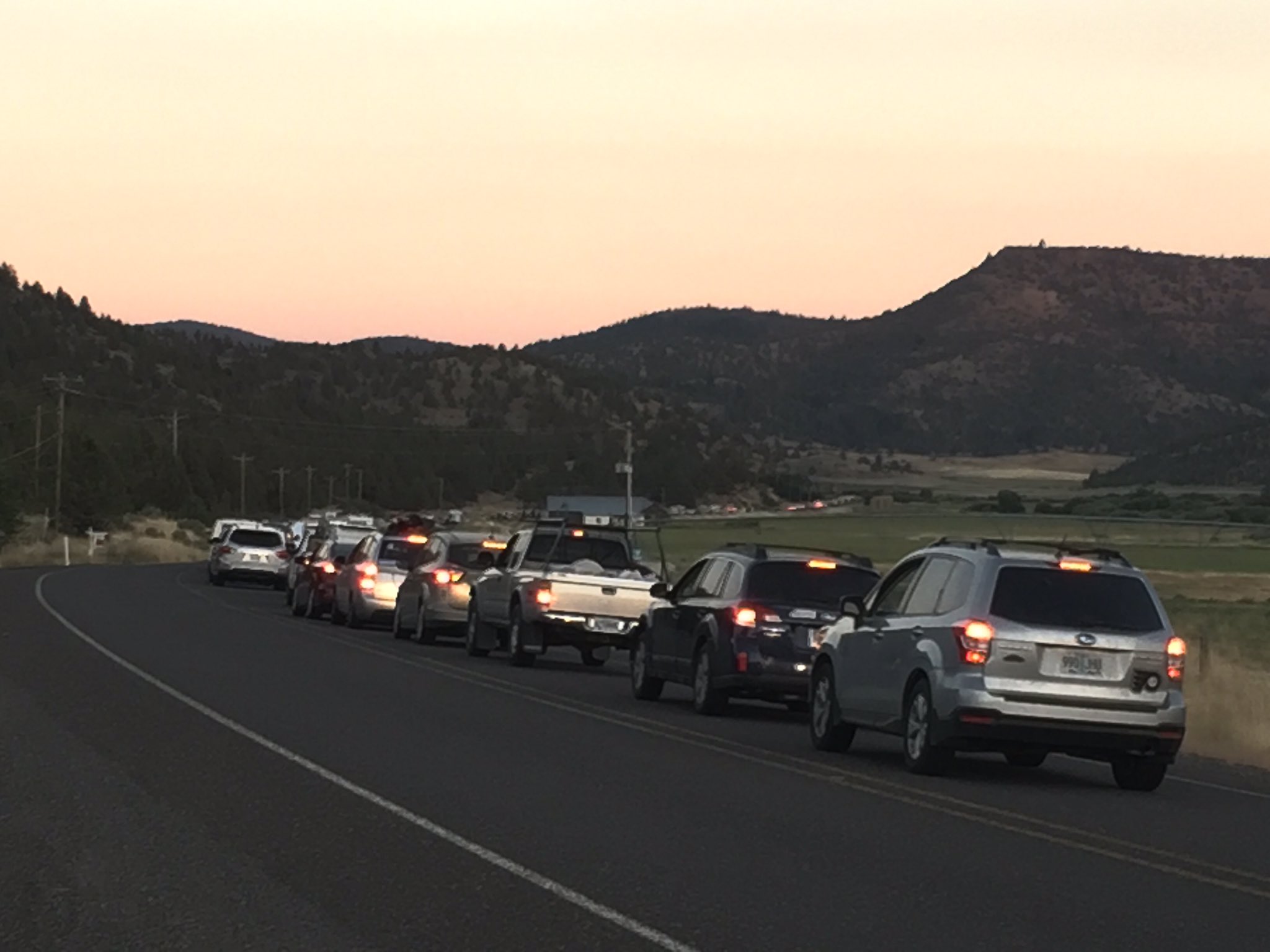 Traffic moves very slowly heading east from Prineville, Ore., on Highway 26.