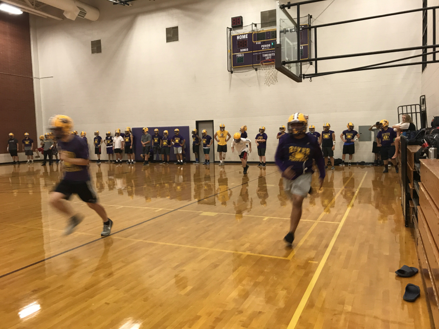 Columbia River players run through sprint drills in the gym Wednesday (Meg Wochnick/The Columbian)