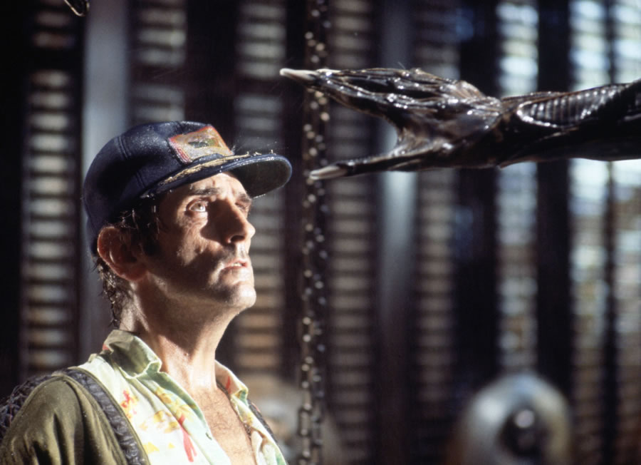 Harry Dean Stanton faces an alien creature in a scene from the 1979 sci-fi-horror film “Alien.” Twentieth Century Fox