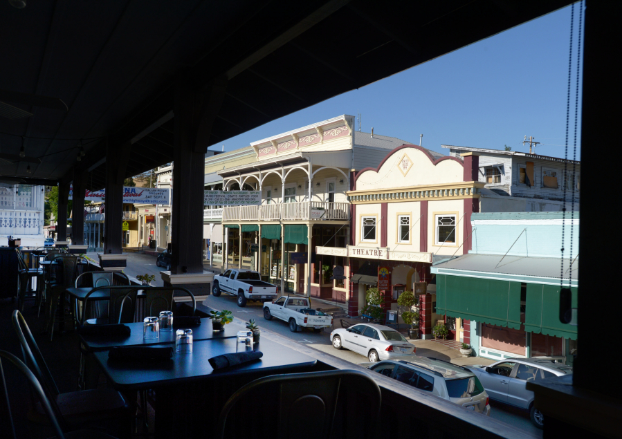 A ringside seat offers a great view of Main Street, where the balcony at Hotel Sutter serves appetizers, afternoon desserts and cocktails in Sutter Creek, Calif., in 2014.