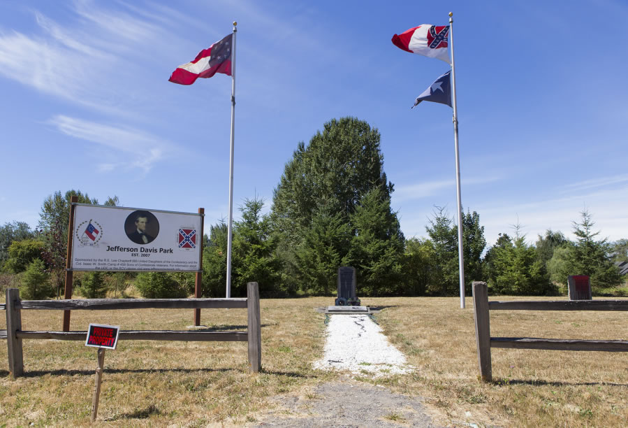 Jefferson Davis Park, which sits in view of Interstate 5 near Ridgefield, includes two stone markers and Confederate flags.