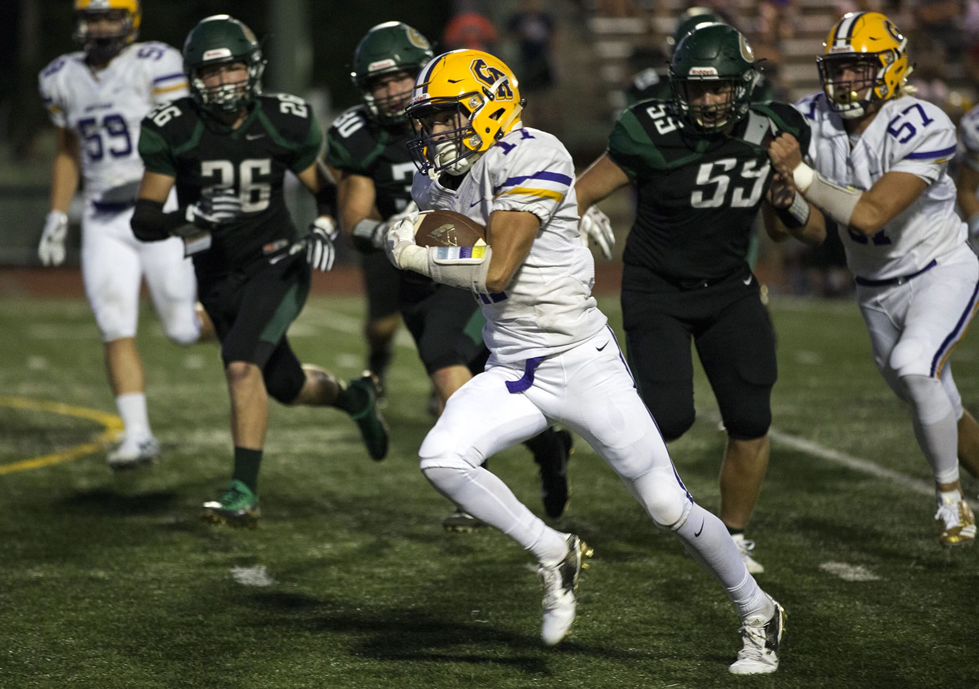 Chieftain Jarrett Seelbinder (17) makes a run during their Friday night football game between Columbia River and Evergreen High School at McKenzie Stadium in Vancouver on Friday, Sept. 1, 2017. The Plainsmen beat the Cheiftains 26 to 13.