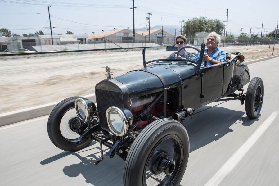 Clayton Paddison, left, and Jay Leno cruising in California in Paddison’s beloved Model T Ford.