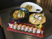 The Ilani roll, spicy red miso ramen with added pork belly, tako and pork shumai are pictured at the Ilani Casino Resort.