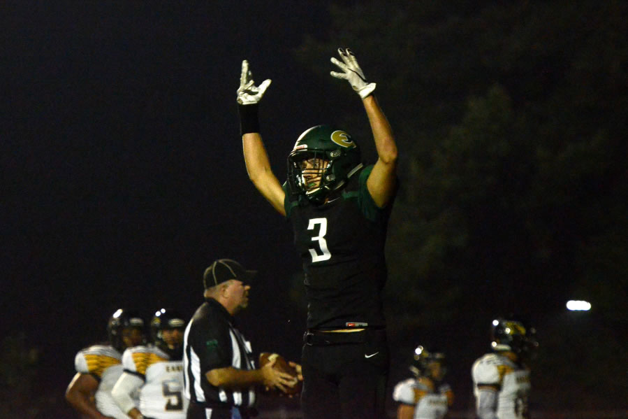 Evergreen receiver Nadil Hodzic celebrates after scoring a touchdown .