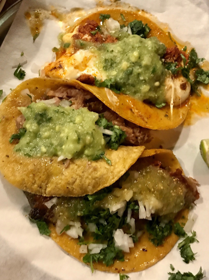 Whether a taco can change your life is up for debate, but the tacos at Little Conejo will be some of the best you’ve eaten. Here you can see the chorizo queso taco, a lengua taco, and a carnitas taco.