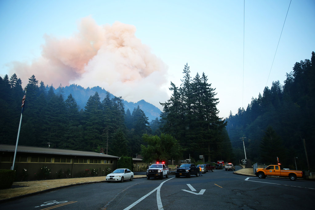Fire burns in the Eagle Creek area of Columbia River Gorge, Saturday, Sept. 2, 2017. Officials reported that they had rescued six hikers Sunday morning, who were among about 140 forced to spend the night outside near Tunnel Falls after a fire broke out near the popular Columbia River Gorge trail about 90 miles east of Portland.