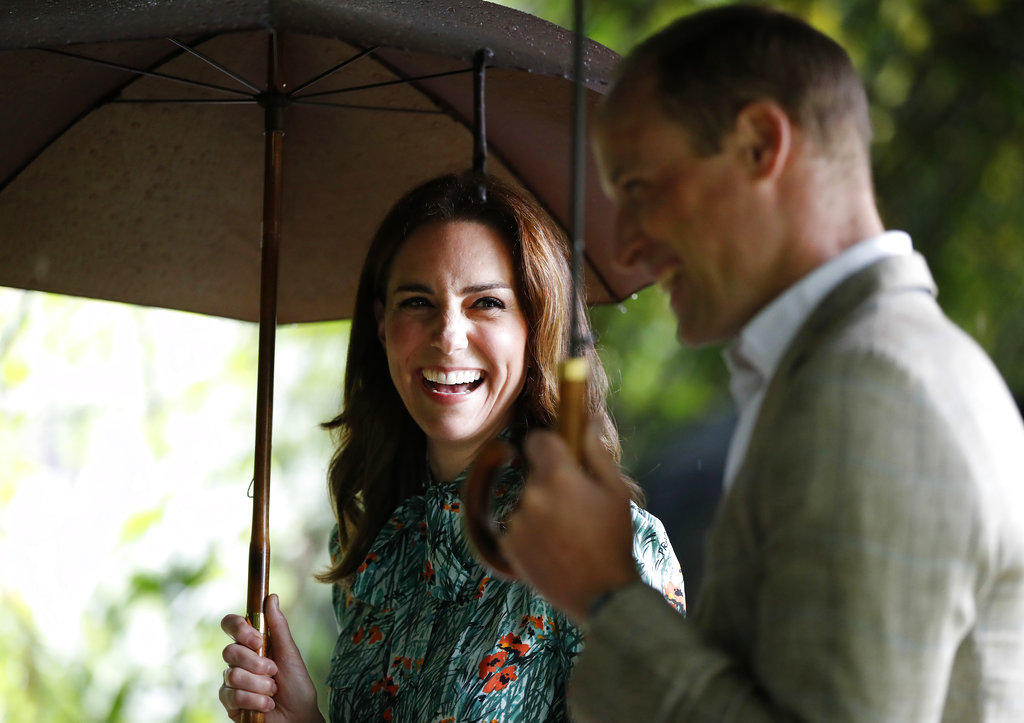 FILE - In this Wednesday, Aug. 30, 2017 file photo Britain's Prince William and his wife Kate, Duchess of Cambridge smile as they walk through the memorial garden in Kensington Palace, London. Kensington Palace says Prince William and his wife, the Duchess of Cambridge, are expecting their third child. The announcement released in a statement Monday Sept. 4, 2017 says the queen is delighted by the news.