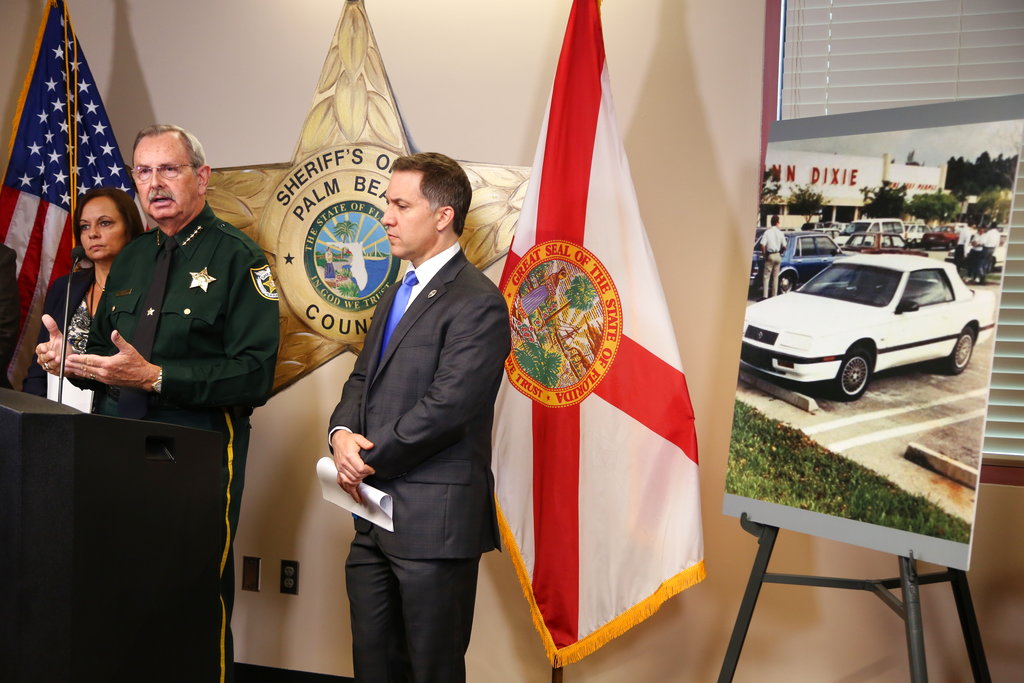 Palm Beach County Sheriff Ric Bradshaw speaks during a news conference to announce the arrest of Sheila Keen Warren, Thursday, Sept. 28, 2017, in West Palm Beach, Fla.,   Sheriff’s detectives say advances in DNA technology led to the arrest in connection with the 1990 fatal shooting of a Florida woman by an assailant dressed as a clown.  Bradshaw said that without the advances, detectives would not have been able to conclusively tie Sheila Keen Warren to the slaying of Marlene Warren.