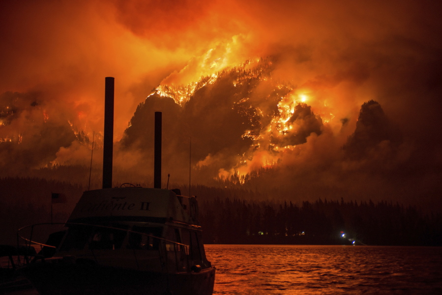This Monday Sept. 4, 2017, photo provided by KATU-TV shows the Eagle Creek wildfire as seen from Stevenson Wash., across the Columbia River, burning in the Columbia River Gorge above Cascade Locks, Ore. A lengthy stretch of highway Interstate 84 remains closed Tuesday, Sept. 5, as crews battle the wildfire that has also caused evacuations and sparked blazes across the Columbia River in Washington state.