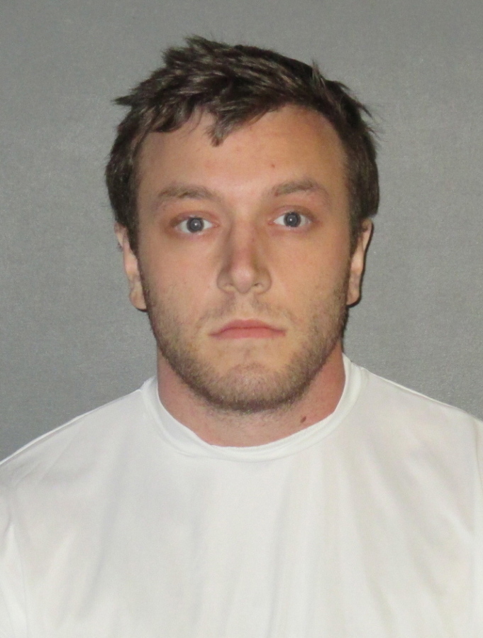 Kenneth Gleason is shown in an undated booking photo provided by the East Baton Rouge Sheriff’s Office. Police believe the slayings of two black men in Baton Rouge were likely racially motivated and said Sunday that they have a person of interest — Gleason— in custody. Gleason, was being held on drug charges. Authorities do not yet have enough evidence to charge him with murder, Baton Rouge Sgt. L’Jean McKneely told The Associated Press.