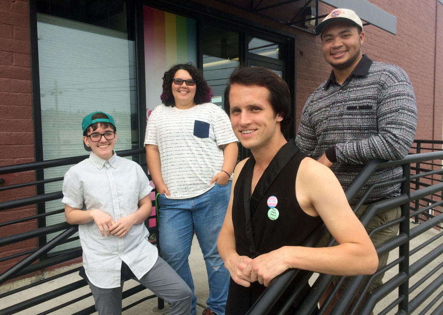 In this Sept. 9, 2017 photo, from left: Louie Borgen, 19, Skylar Robinson, 16, Timmie Flock, 23, and Theo Calhoun, 20, pose outside the LGBT youth center, in Tacoma, Wash. Washington natives soon might be able to change the gender designation on their birth certificates to one that is neither male nor female. Call it gender X or the more clinical term: non-binary. The group, all members of Tacoma's Oasis Youth Center, would welcome a non-binary gender option on Washington State birth certificates.