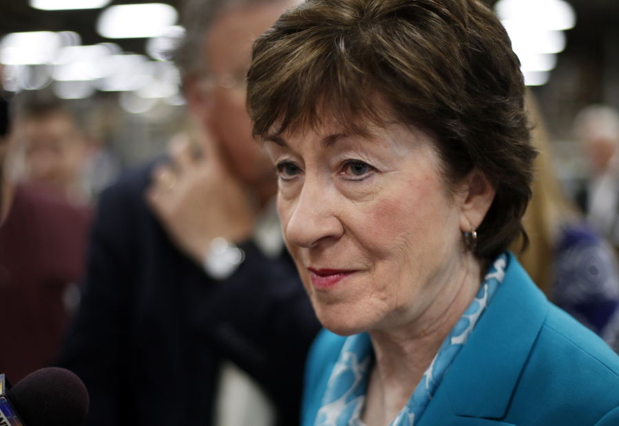 Sen. Susan Collins, R-Maine, takes a question from a reporter Aug. 17 while attending an event in Lewiston, Maine. The last-gasp Republican drive to tear down President Barack Obama’s health care law essentially died Monday, as Collins joined a small but decisive cluster of GOP senators in opposing the push. (AP Photo/Robert F.