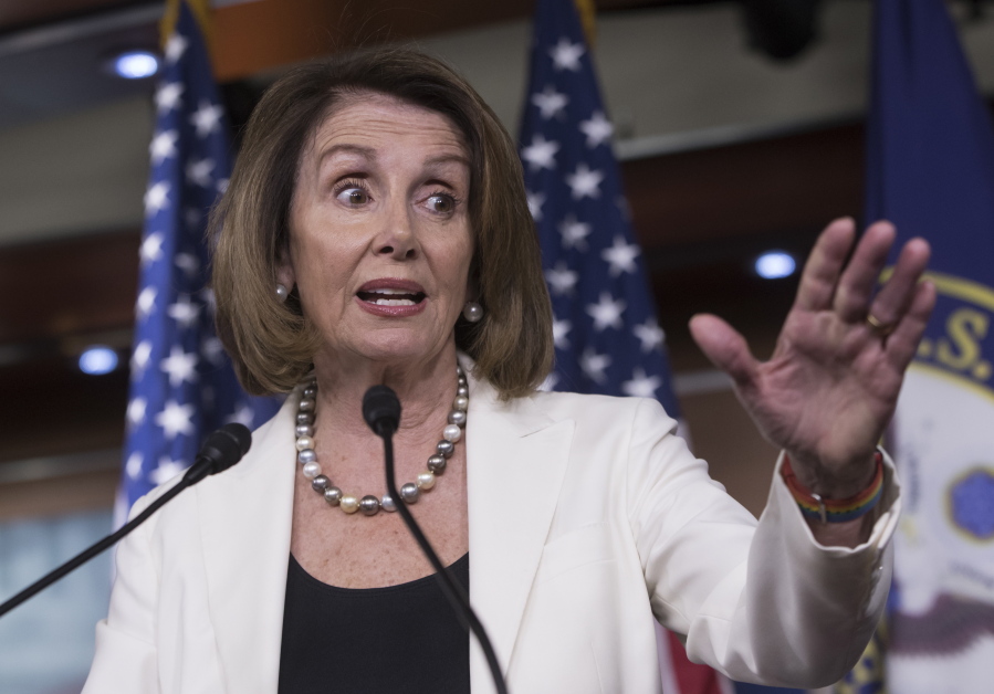House Minority Leader Nancy Pelosi, D-Calif., talks with reporters at the Capitol on Thursday, the morning after she and Sen. Chuck Schumer, D-N.Y., met with President Donald Trump seeking a legislative solution to the DACA program. J.