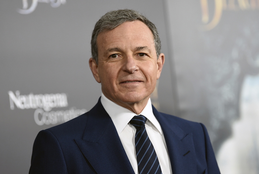 FILE - In this Monday, March 13, 2017, file photo, The Walt Disney Company CEO Robert Iger attends a special screening of Disney’s “Beauty and the Beast” at Alice Tully Hall in New York. Disney is adding more firepower to the kids streaming service expected in 2019. Iger said its Star Wars and Marvel comic-book movies will be included in the service as well as Disney and Pixar movies and TV shows. In the U.S., that will be the only way to stream those films on demand.