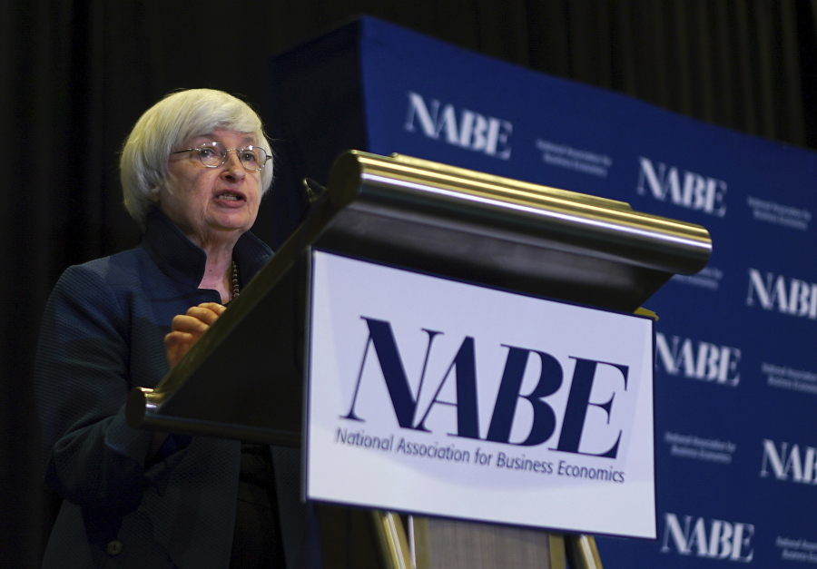 Federal Reserve Chair Janet Yellen speaks at an economics conference, Tuesday in Cleveland. Yellen has acknowledged that the Fed is puzzled by the persistence of unusually low inflation and that it might have to adjust the timing of its interest rate policies accordingly.