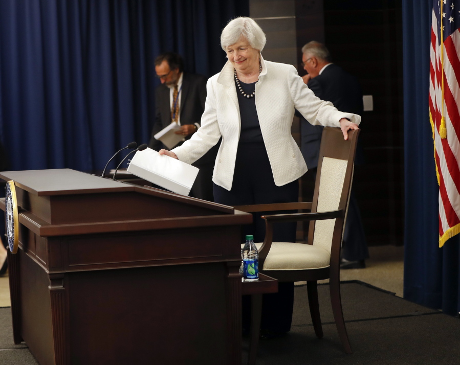 Federal Reserve Chair Janet Yellen takes her seat before speaking during a news conference in Washington on Wednesday.