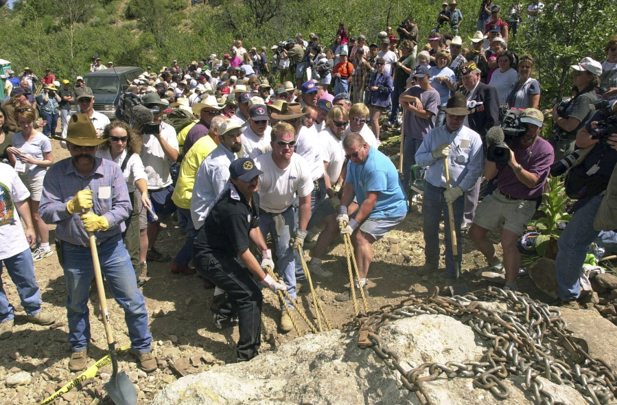 Supporters and members of what was known as the Jarbidge Shovel Brigade move “Liberty Rock” in 2000, opening the road to the Jarbidge Wilderness near Jarbidge, Nev., a small town in northern Elko County. A federal judge in Reno ruled against rural Elko County this week and closed the 18-year-old case surrounding a sometimes volatile feud over the road in remote wilderness near the Idaho line.