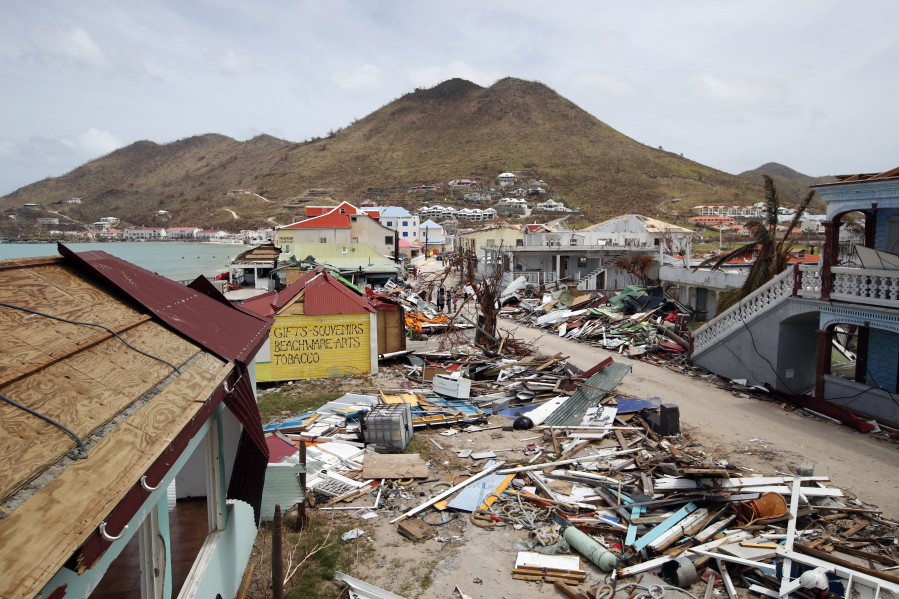 View of the partially buildings destroyed by Irma during the visit of France’s President Emmanuel Macron in the French Caribbean islands of St. Martin, on Tuesday. Macron is in the French-Dutch island of St. Martin, where 10 people were killed on the French side and four on the Dutch.