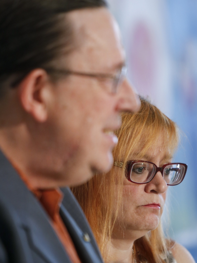 Lynne Schultz, right, mother of Scout Schultz, looks on as her husband, Bill Schultz, speaks at a news conference in Atlanta, Ga., Monday, Sept. 18, 2017. Scout was a 21-year-old Georgia Tech student who was shot and killed during a confrontation with police on campus Saturday, Sept. 16.