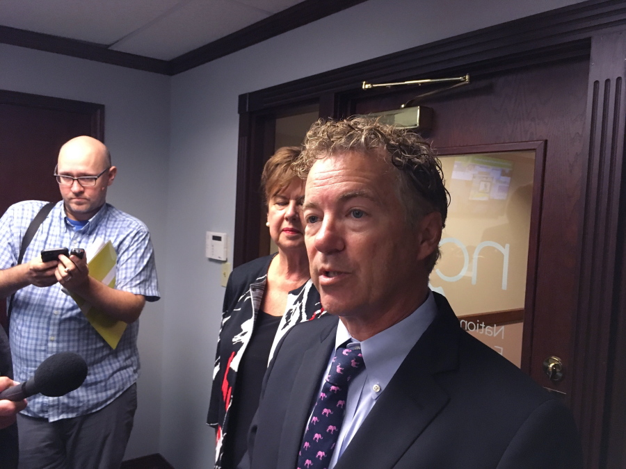 Kentucky Republican U.S. Sen Rand Paul tells reporters he plans to vote against a GOP bill that would repeal and replace most of former President Barack Obama’s health care law on Monday in Louisville, Ky.