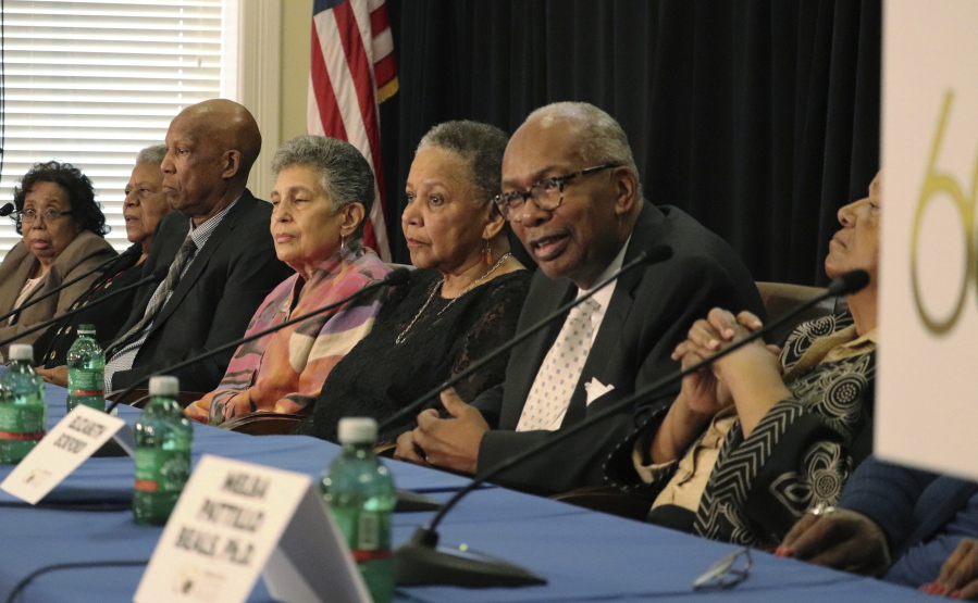 Surviving members of the Little Rock Nine, the students who integrated Central High School in 1957, speak with the media Friday at the Clinton School of Public Service in Little Rock, Ark. From the left are Thelma Mothershed Wair, Minnijean Brown Trickey, Terrence J. Roberts, Carlotta Walls LaNier, Gloria Ray Karlmark, Ernest G. Green and Elizabeth Eckford. Melba Pattillo Beals attended and is off the camera to the right. Jefferson Thomas died in 2010. (AP Photo/Kelly P.