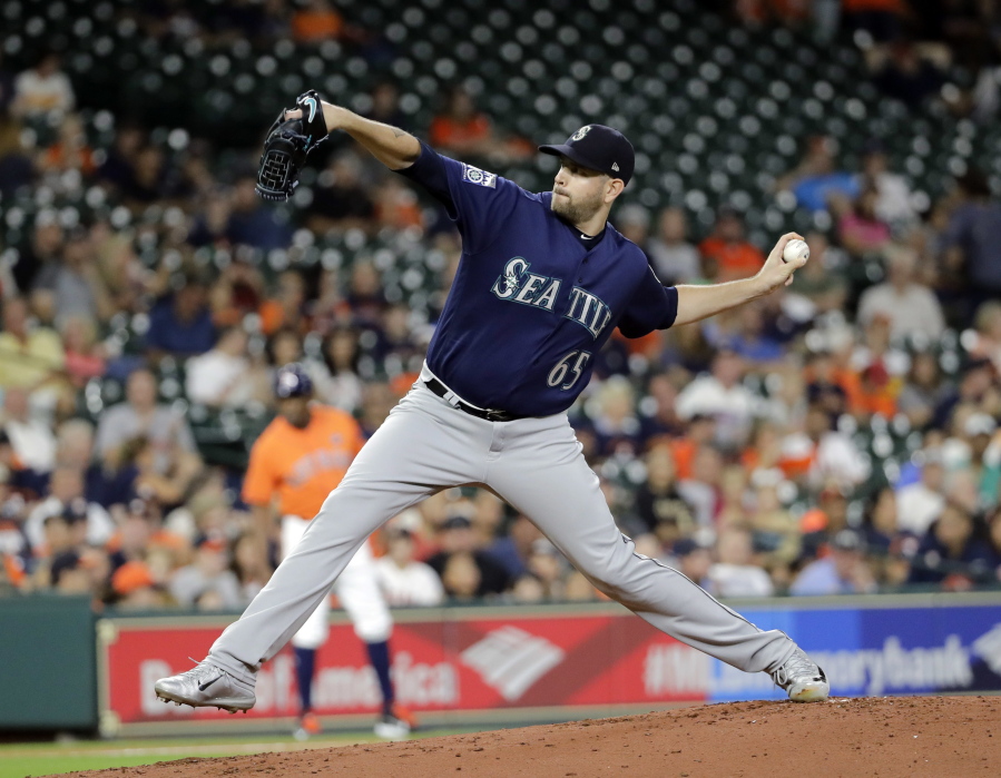 Seattle Mariners starting pitcher James Paxton throws against the Houston Astros during the first inning of a baseball game Friday, Sept. 15, 2017, in Houston. (AP Photo/David J.